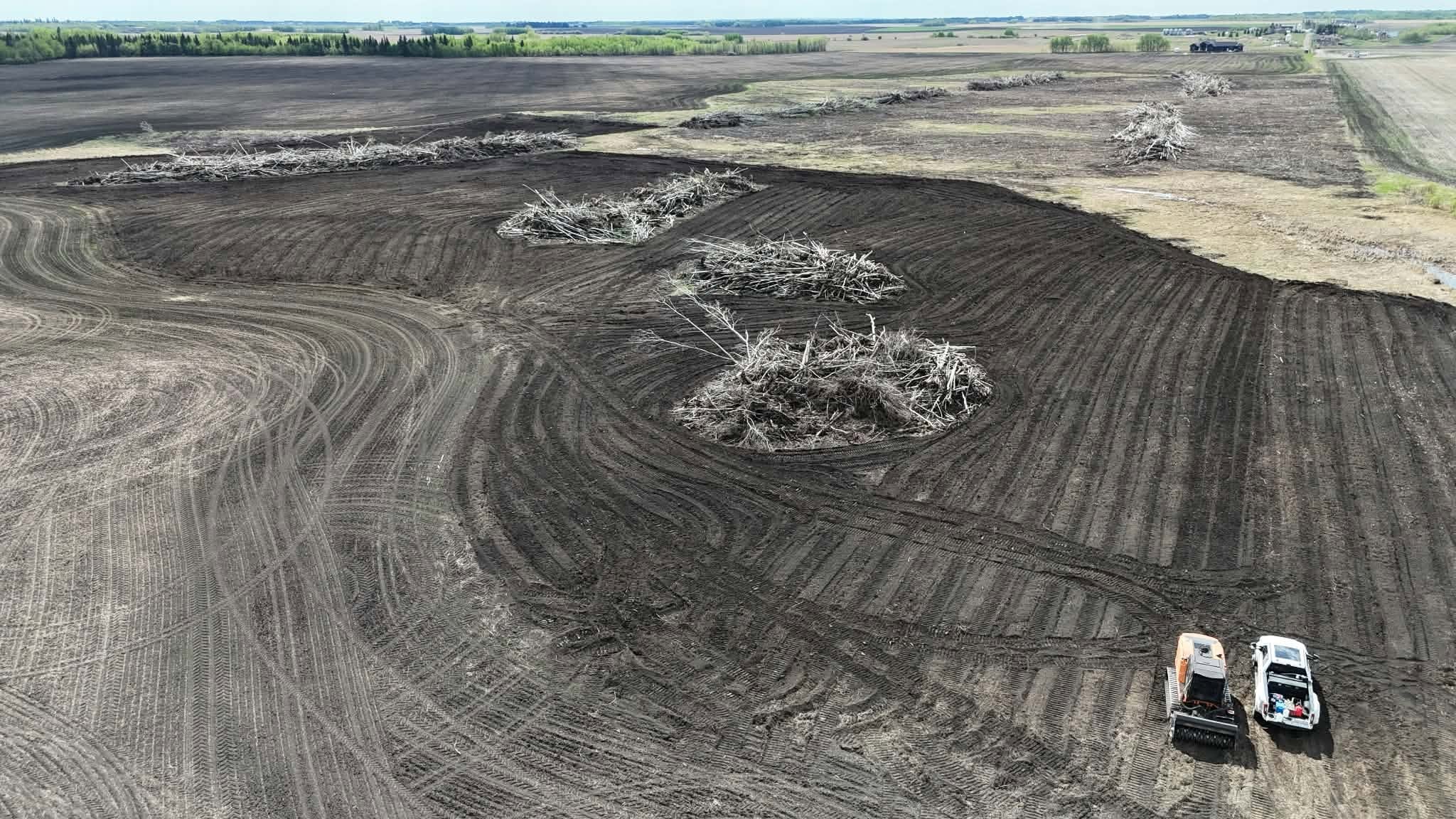 Overtime Mulching equipment clearing land in Alberta